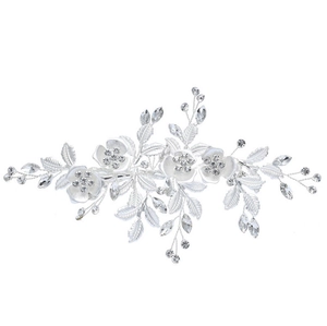 Elegant silver bridal hair comb with crystal flowers and sparkling rhinestone leaves