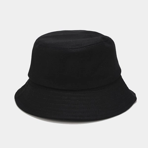 Detail of classic black cotton bucket hat showing fabric texture and wide brim