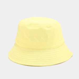 Detailed view of light yellow cotton bucket hat with premium minimalist stitching