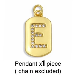 Detailed view of a gold rectangular pendant featuring a zircon-encrusted letter E design