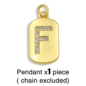 Close-up of gold-plated rectangular pendant with micro-pave letter F zircon setting