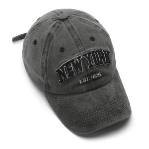 Distressed charcoal cotton baseball cap with embroidered New York text on white background