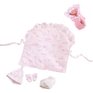 Detailed view of pink cotton baby doll pajamas set with hat and footies on white backdrop