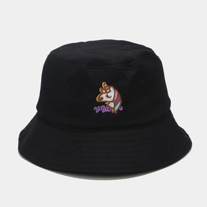 Close-up of black cotton bucket hat with detailed unicorn embroidery and purple text