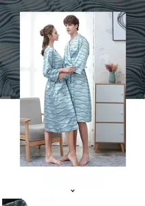 Detail showing the blue and white wave pattern on a lightweight long sleeve silk bathrobe