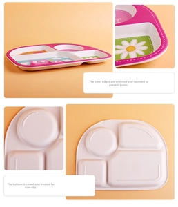 Detail view of pink bamboo fiber kids plate showing wide anti-scald edges and non-slip base