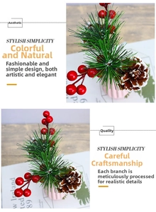 Detail of Christmas pine needles with red berries and pine cone in a pink ceramic vase