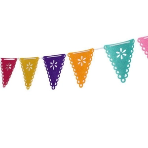 Detail of colorful felt Mexican banner featuring laser-cut floral patterns and wavy edges