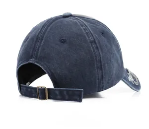 Rear view of washed denim baseball cap with adjustable metal buckle and embroidery