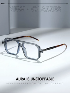 Detail of square blue frame glasses with double bridge and tortoiseshell temples