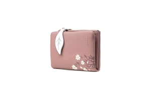 Detailed view of pink floral PU leather wallet with daisy print and leaf-shaped zipper