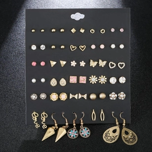 Detailed set of 30 pairs of gold and silver alloy earrings with rhinestones and pearls
