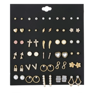 Detailed set of 30 pairs golden alloy stud earrings with crystals and faux pearls