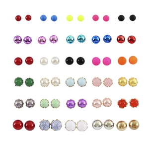 Macro display of 30 pairs flower and gemstone stud earrings in assorted vibrant colors