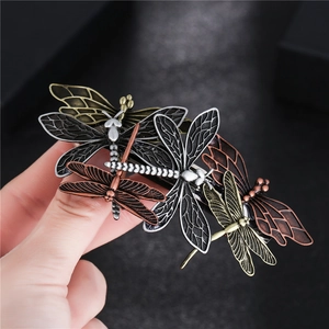 Retro steampunk hair clip with four alloy dragonflies in vintage bronze and silver finishes