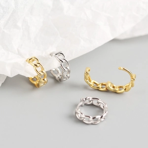 Elegant S925 sterling silver chain hoop earrings in gold and silver finishes on textured paper