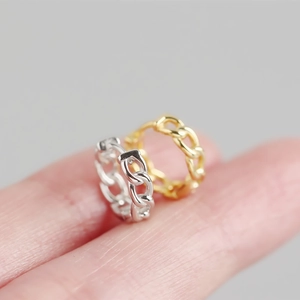 Macro shot of silver and gold chain style hoop earrings in premium S925 sterling silver
