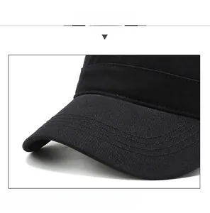 Detail of durable black cotton military cap featuring reinforced brim and structured shape