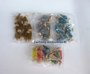 Miniature sisal Christmas tree set with wooden bases in colorful retail packaging