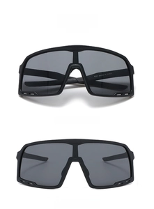 Front and side view of black sports sunglasses with grey lenses and windproof frame