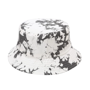 Close-up of tie-dye bucket hat showing high-quality canvas stitching and marble pattern