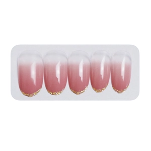Pink ombre press-on nails with gold glitter accents in a natural round shape