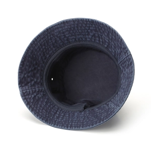 Deep blue washed cotton bucket hat featuring vintage texture and breathable eyelets