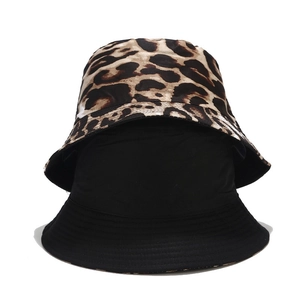 Reversible leopard print and solid black cotton bucket hat for outdoor sun protection