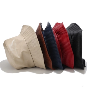 Minimalist PU leather bucket hats for women in five colors with a smooth faux leather texture