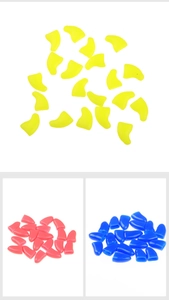 Detailed close-up of soft silicone pet nail covers in bright yellow, red, and blue colors