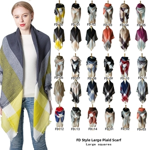 Detailed grid showing diverse color options of large plaid cashmere-feel scarves with tassels