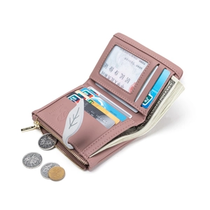 Pink bifold short wallet for women featuring leaf decoration and multiple card slots