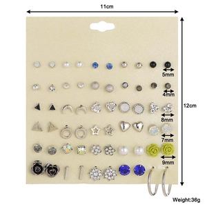 30 pairs of assorted crystal and alloy stud earrings with hoop detail on display card