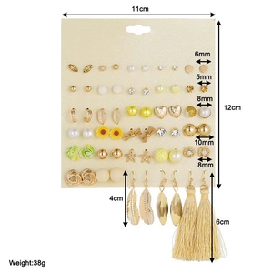 Detailed view of alloy earring set featuring varied stud and hoop sizes with dimensions