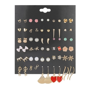 Detailed set of 30 pairs of fashion stud earrings in flower and animal shapes