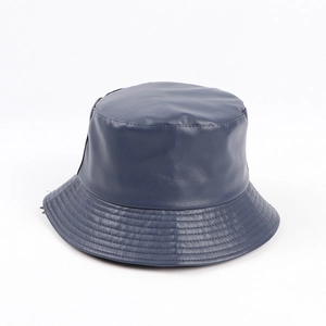 Detail view of navy blue PU leather bucket hat with reinforced brim stitching