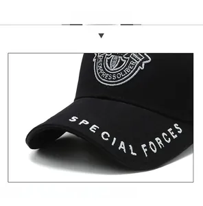 Detail of Special Forces embroidery on black cotton twill baseball cap with curved brim