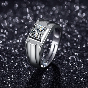 Macro view of adjustable silver mens ring with round moissanite in square setting