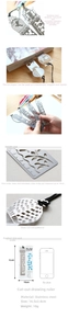 Detail of vintage hollow stainless steel ruler bookmark with creative stencil patterns