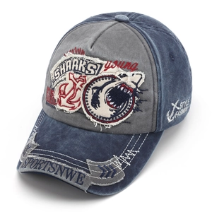 Distressed wash color-block baseball cap featuring shark embroidery and vintage patches