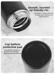 Detail of vacuum mug featuring smooth lip rim and anti-slip rubber base on marble background