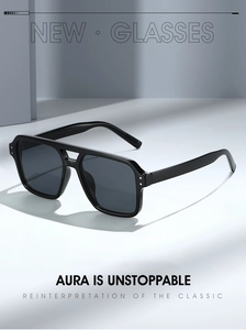 Detail of square oversized sunglasses with double bridge and silver rivet accents