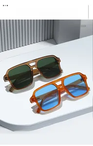 Close-up of stylish oversized square sunglasses with double bridge and tinted lenses