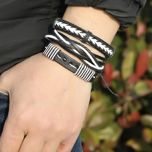 Set of 4 minimalist multilayer woven leather bracelets in black and white for men