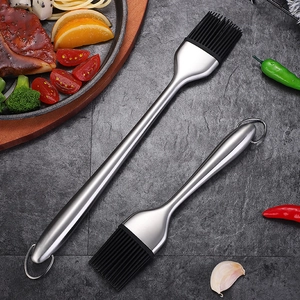 Professional heat-resistant 304 stainless steel silicone basting brushes on dark stone