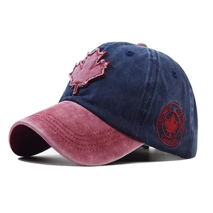 Detail of vintage washed baseball cap featuring contrast stitching and Canada maple leaf patch