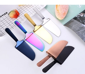Macro shot of colorful stainless steel cake servers with serrated edges and smooth handles