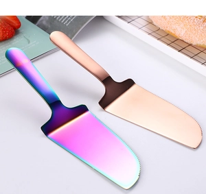 Rainbow and rose gold stainless steel cake servers with serrated edges for baking