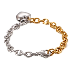 Two-tone silver and gold stainless steel link chain bracelet with a polished heart pendant