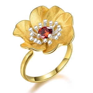 Luxurious S925 silver flower ring with matte gold petals and a large red garnet stone